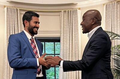 Aly Madhavji (L), was honoured to accept the award from its namesake, Desmond Parker (R)