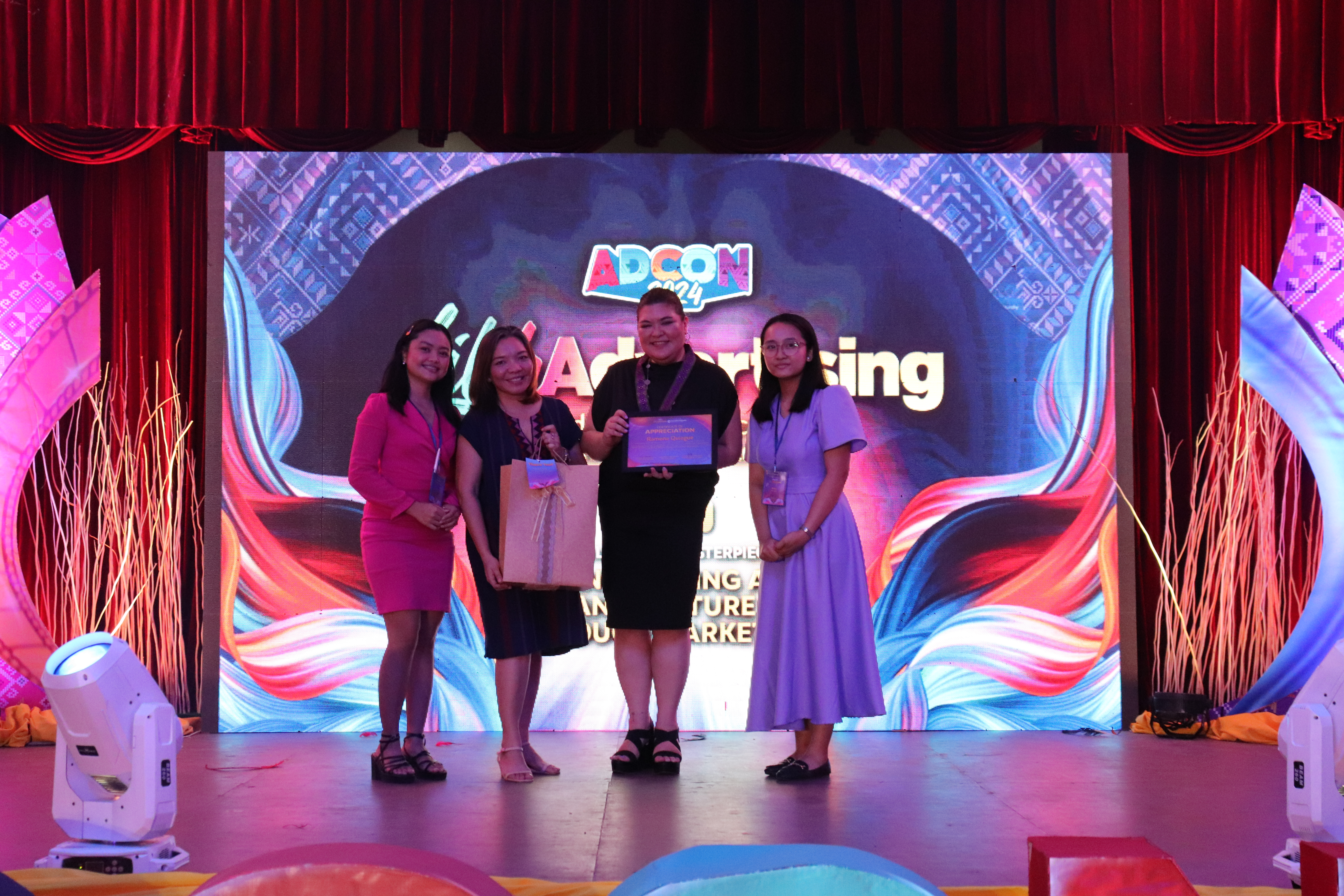 From Left to Right: Ezra Jane Mendoza, ADCON 2024 Co-Chairperson for Day 1, Prof. Ma. Theresa Albaña, ADCON Adviser, Monette Quiogue of Bookshelf PH, and Mary Rose Pagador, ADCON Chairperson for Day 1