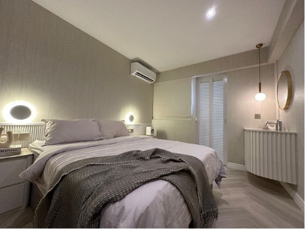 The master bedroom is cosy, elegant and minimalistic.